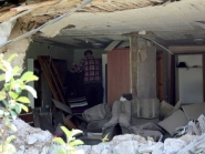 Разрушения в Александровске после обстрела украинской армией